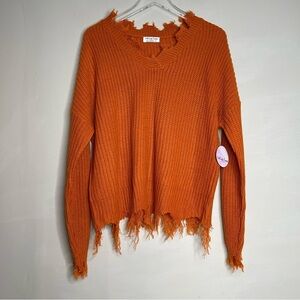Full circle thread distressed knit sweater